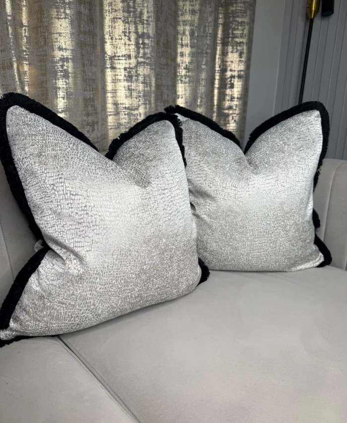 Luxury silver grey textured cushion cover with black contrast trim, modern neutral throw pillow cover styled upright against white background